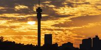 The sun rises behind the skyline of Johannesburg, South Africa, on 5 December 2023, as another day starts during an ongoing heat wave. South Africa recorded the highest temperatures on record at Augrabies Falls National Park where temperatures reached 46.7 degrees Celsius, and 46.6 degrees Celsius at Vioolsdrift.  (Photo: EPA-EFE / Kim Ludbrook)