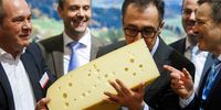 German Minister for Food and Agriculture, Cem Ozdemir (4-L), smells a piece of cheese at the booth of Switzerland during the opening of the International Green Week fair in Berlin, Germany, 19 January 2024. The International Green Week fair runs from 19 to 28 January 2024.  EPA-EFE/CLEMENS BILAN