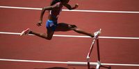 TOKYO, JAPAN - AUGUST 04:  Dalilah Muhammad of Team United States competes in the Women's 400m Hurdles Final on day twelve of the Tokyo 2020 Olympic Games at Olympic Stadium on August 04, 2021 in Tokyo, Japan. (Photo by Matthias Hangst/Getty Images)