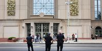 Police stand across from Waterbury Superior Court  in Connecticut during the start of proceedings in the Alex Jones case. Jones called the 2012 Sandy Hook shooting a hoax. (Photo: Spencer Platt / Getty Images)