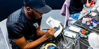 Sneaker painting at Comic Con Cape Town. Image: Matthew Sleep