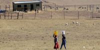 Villagers often walk long distances to fetch water from rivers or boreholes, sometimes across districts in the drought-stricken areas of the Eastern Cape. (Photo: Black Star/Spotlight)