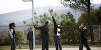 Learners at Crags Primary School in Kurland, play netball during first break. (Photo: Daily Maverick)