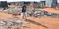 Anna Titus from Mangaung informal settlement in Vredendal carries supplies during the water outage in September. (Photo: Nathi Qondile)