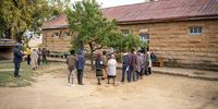 Voters wait in line to cast their vote at the St. Joseph Primary school in Koro-Koro, on October 7, 2022 where voting operations for the parliamentary elections are underway. October 7, 2022.<br>Photo: Shiraaz Mohamed.