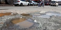 Potholes along Lilian Ngoyi Street on February 20, 2023 in Johannesburg, South Africa. It is reported that the South African National Roads Agency (SANRAL) has disputed the claim that  the country has 25 million potholes on its roads. (Photo: Gallo Images/Luba Lesolle)