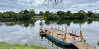 Only one way to cross the Kafue River. Photographer: Ian Weir