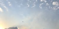 Aerial ballet. 5pm Sunday 18th April, after hours of Rondebosch being in thick smoke, the winds shifted and the choppers had access to water bomb the university.