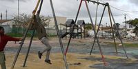 The frame of a swing set in Baba Park, Mfuleni, with all the swings missing. (Photo: Tamsin Metelerkamp)