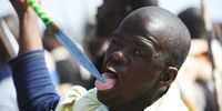A miner leaks his spear while gathering at the koppie outiside nkaneng informal settlement near the Lonmin mine in Rustenburg north west.(Photo: Felix Dlangamandla)