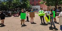 Protestors hold up placards during a Black Lives Matter demonstration in Sunbury, Pennsylvania. (Photo: supplied)