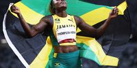 epaselect epa09382859 Elaine Thompson Herah of Jamaica celebrates winning the Women's 100m Final during the Athletics events of the Tokyo 2020 Olympic Games at the Olympic Stadium in Tokyo, Japan, 31 July 2021.  EPA-EFE/VALDRIN XHEMAJ
