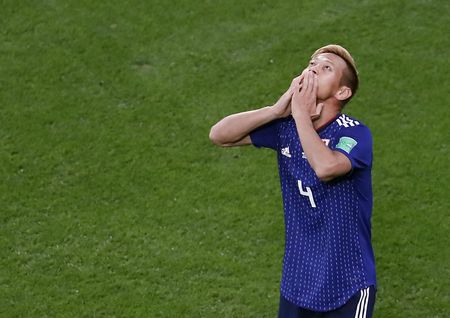 Honda hits late Japan leveller to blow World Cup group wide open