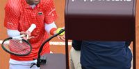 Novak Djokovic of Serbia (L) argues with the umpire during his men's quarter final round match against Holger Rune of Denmark (not pictured) at the Italian Open tennis tournament in Rome, Italy, 17 May 2023.  EPA-EFE/ETTORE FERRARI