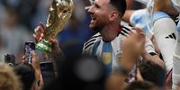 Lionel Messi of Argentina holds the World Cup Trophy during the FIFA World Cup Qatar 2022 Final match between Argentina and France at Lusail Stadium on 18 December 2022 in Lusail City, Qatar. (Photo: Ian MacNicol / Getty Images)