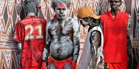 Members of the Yolngu people from north-eastern Arnhem Land prepare to perform  the Bunggul traditional dance during the 'Garma Festival of Traditional Cultures' near Nhulunbuy, East Arnhem Land, Northern Territory, Australia, 05 August 2023. The 23rd edition of the annual festival is hosted by the Yothu Yindi Foundation from 04 to 07 August and is described as 'Australia's largest Indigenous gathering' that celebrates Yolngu life and culture for four days.  EPA-EFE/MICK TSIKAS
