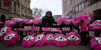 Climate activists take part in an anti-oil protest outside Intercontinental Hotel on October 17, 2023 in London, England. Activists join an environmental protest as the Energy Intelligence Forum conference takes place in Mayfair. (Photo by Carl Court/Getty Images)