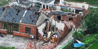 epaselect epa10799929 Damaged houses in the aftermath of a tornado in Dafeng district, Yancheng City, Jiangsu province, China, 14 August 2023. At least two people were killed and 15 others were injured, while nearly 300 farm houses were damaged, according to state media preliminary data.  EPA-EFE/CFOTO / Fang Dongxu CHINA OUT