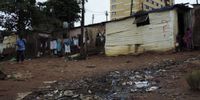 A stream of sewage water from a neighbouring apartment building runs through the Lacey Road informal settlement in Sydenham, Durban on 22 April 2019. Photo: Aisha Abdool Karim. 