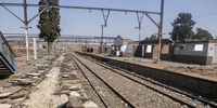 Klipspruit train station. The tar on the platform was dug up to gain access to the electric cable running beneath. (Photo: Shiraaz Mohamed)