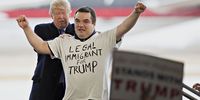 Donald Trump, president and chief executive of Trump Organization Inc. and 2016 Republican presidential candidate, left, stands with a man he called onto the stage from the crowd because of the "Legal Immigrant For Trump" t-shirt he was wearing, during a campaign event in Bloomington, Illinois, U.S., on Sunday, March 13, 2016. After violent protests prompted Donald Trump to cancel a rally in Chicago on Friday night, the Republican presidential front-runner blamed the activist group MoveOn.Org and supporters of Senator Bernie Sanders for the chaos, while defending his own harassed supporters. Photographer: Daniel Acker/Bloomberg via Getty Images