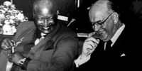 George Matanzima and PW Botha share a laugh: Cropped from Pretoria Archives photo.