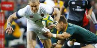Damian de Allende (R) of South Africa tackles Mike Brown (L) of England during the rugby test match at the Ellis Park Stadium in Johannesburg, South Africa, 09 June 2018.  EPA-EFE/KIM LUDBROOK
