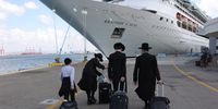 Ultra Orthodox Jews arrive to board the US 'Rhapsody Of The Seas' ship in Haifa Port, northern Israel, 16 October 2023. Israel has warned all citizens of the Gaza strip to move to the south ahead of an expected invasion. More than 2,750 Palestinians and 1,300 Israelis have been killed according to the IDF and Palestinian health ministry, after Hamas militants launched an attack against Israel from the Gaza Strip on 07 October.  EPA-EFE/ABIR SULTAN