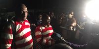 Hopewell Chin’ono, left, and Jacob Ngarivhume talk to the media at Chikurubi Maximum Security Prison after their successful bail application. (Photo: Doug Coltart)