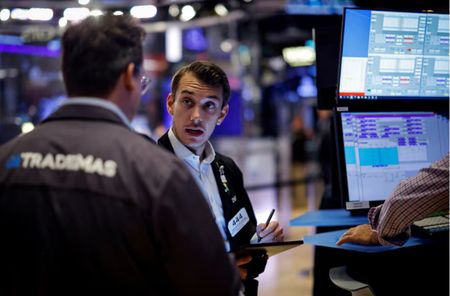 Stocks bask in Trump glow, tariff uncertainty weighs on dollar