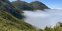 Hiking above the clouds. Photographer: Donelle Theron