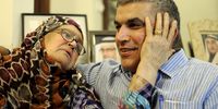 Rights activist, Nabeel Rajab, (R) sits with his mother shortly following his release, at his home in Bani Jamrah village, north of the Bahraini capital Manama, 28 May 2012. In 2018, Rajab was sentenced to five years in jail for tweeting about the war in Yemen. EPA/MAZEN MAHDI