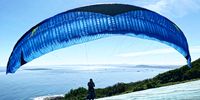 Paraglider double check before take-off from Signal Hill. Photographer: Chris von Ulmenstein
