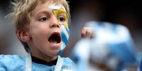  A young supporter of Uruguay before the FIFA World Cup 2018 quarter final soccer match between Uruguay and France in Nizhny Novgorod, Russia, 06 July 2018.  EPA-EFE/TOLGA BOZOGLU 