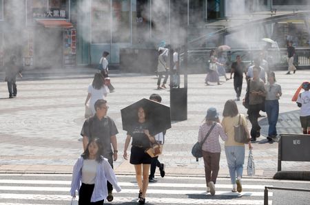 Keeping cool, Tokyo style: Shorts, sneakers and no ties