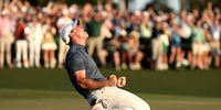 Rory McIlroy of Northern Ireland celebrates winning the 2025 Masters tournament after a playoff hole on the 18th green at Augusta National Golf Club on 13 April 2025 in Augusta, Georgia. (Photo: Richard Heathcote / Getty Images)