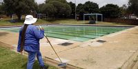 File photo: City of Joburg employees are cleaning the Noordgesig swimming pool. (Photo: Felix Dlangamandla)