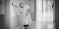 Nasreen Raschid rests against a wall in one of her Cape Town hospital’s corridors. (Photo: Shiraaz Mohamed)