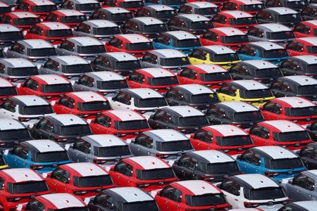 Toyota Shares Sink Most in Nearly Two Years on Output Target Cut