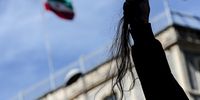 epa10207292 An Iranian woman holds piece of her hair she cuts off, during a protest outside the Iranian Consulate following the death of Mahsa Amini, in Istanbul, Turkey, 26 September 2022. Protests have erupted in Iran and across the world after the death of Mahsa Amini who died last week in custody of Iran's morality police.  EPA-EFE/SEDAT SUNA