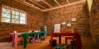 The classroom, 4m by 5m, is insulated by the ecobricks. Thoriso Nursery School principal Linda Ngoma said, 'It is the best classroom because it’s warm.’ (Photo: Julia Evans)