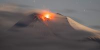 'Sangay Dawn'. Sangay has been active for the last couple of years in Ecuador, sending ash to cities that are hundreds of miles away. I travelled to the volcano and waited for 72 hours before I could photograph it at dawn with the clouds and stars in the same picture. © Kevin Moncayo, Ecuador, 2nd Place, Latin America National Awards, Sony World Photography Awards 2023