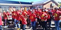 NUMSA members protest outside the Kasselsvlei Community Hall in Bellville on Tuesday. (Photo: Marecia Damons)