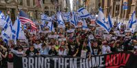 NEW YORK, NEW YORK - JUNE 2: People, including the families of hostages, walk at the front holding a 'Bring them home now' sign at the the Israel Day on Fifth parade on June 2, 2024 in New York City. The NYPD will increase security for the parade due to tensions and protests surrounding the war in Gaza. This year's parade will focus on "solidarity, strength and resilience" according to Mark Treyger, CEO of the Jewish Community Relations Council. (Photo by Adam Gray/Getty Images)