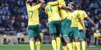 Bafana Bafana players celebrate after winning the crucial 2026 Fifa World Cup qualifier against Rwanda at Mbombela Stadium on 14 October 2025. (Photo: Dirk Kotze / Gallo Images)