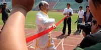Chinese man Guo Cairu, 105-years-old, sprints during an activity in which he challenges the 100 meter run record for centenarians on May 10, 2005 in Nanjing of Jiangsu Province, China. Guo finished in a time of 35.24 seconds though failed to break the record of 30.86 seconds set by 100-year-old South African Philip Rabinowitz last year. Guo stated that he will challenge the record again.  (Photo by China Photos/Getty Images)