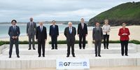 CARBIS BAY, CORNWALL - JUNE 11: (L-R) Canadian Prime Minister Justin Trudeau, President of the European Council Charles Michel, US President Joe Biden, Japanese Prime Minister Yoshihide Suga, British Prime Minister Boris Johnson, Italian Prime Minister Mario Draghi, French President Emmanuel Macron, President of the European Commission Ursula von der Leyen and German Chancellor Angela Merkel, pose for the Leaders official welcome and family photo during the G7 Summit In Carbis Bay, on June 11, 2021 in Carbis Bay, Cornwall. UK Prime Minister, Boris Johnson, hosts leaders from the USA, Japan, Germany, France, Italy and Canada at the G7 Summit. This year the UK has invited India, South Africa, and South Korea to attend the Leaders' Summit as guest countries as well as the EU. (Photo by Leon Neal - WPA Pool/Getty Images)