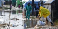 A man removes water from a shack after heavy rains in Motherwell, Gqeberha, on 10 June 2025. (Photo: Gallo Images / Die Burger / Lulama Zenzile)