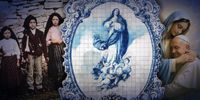 From left: Jacinta (6) and Francisco (8) Marto with their cousin Lucia dos Santos (10). Photo: Wikimedia CommonsThe Virgin Mary in blue and white Azulejo tiles on the wall of the historic church and convent of Carmo in Guimaraes, Portugal. Photo: iStockAbove: Pope Francis in the arms of Mary. Image: AI