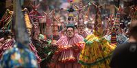 Groups of traditional dancers perform through the streets of the town as part of the 'Santa Maria Magdalena Patron Feast' on July 20, 2025 in Xico, Veracruz, Mexico. Thousands of people visit Xico to celebrate the town's patron saint, Santa Maria Magdalena. The event offers many cultural and religious activities, as the streets are decorated with sawdust carpets, many groups perform dances, and people gather to take part in different processions. (Photo by Hector Quintanar/Getty Images)